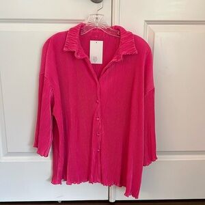 Women’s pink two piece top and shorts